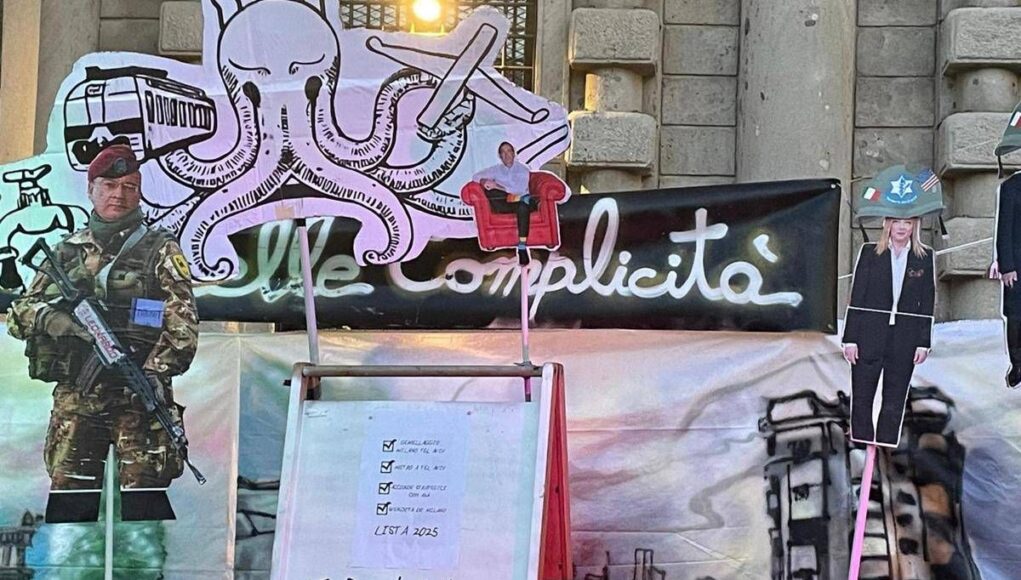 Scala, la protesta prima dell’evento: Meloni e ministri ritratti con l’elmetto